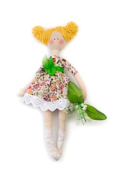 Knitted doll with fishnet pantyhose tilde. Isolate on white.