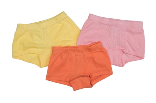 Three female underpants of different types isolated on white background