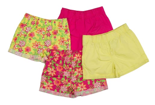 Four colored children's shorts. Isolate on white.