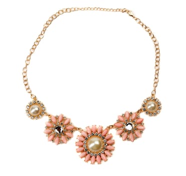 Necklace with pink stones on a gold chain. Isolate on white.