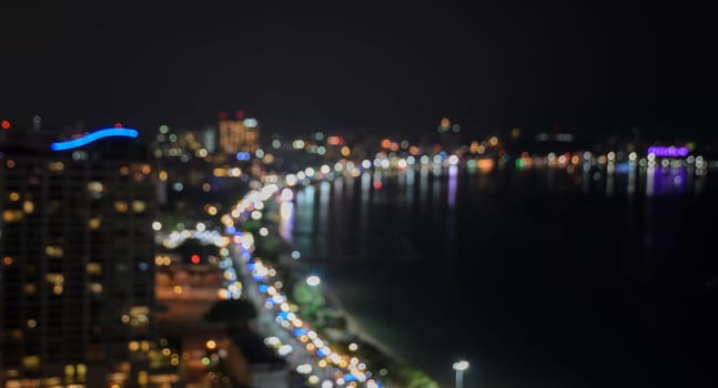Aerial view of Pattaya city beach, Thailand - defocused night lights