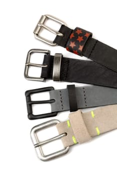 Four leather strap with buckles. Isolate on white