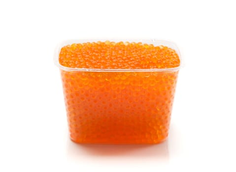 Red caviar in a plastic pot isolated on white background.