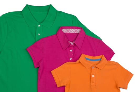 Three colored polo shirt close-up. Isolate on white.