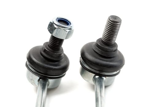 Close-up of two steel suspension arms of the vehicle. Isolate on white.