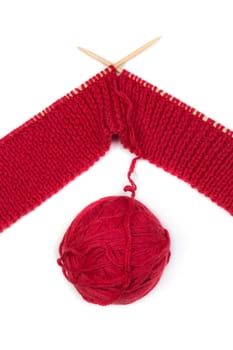 Lifes knitting needles tangle of red thread. Handmade crafts. Isolate on white.