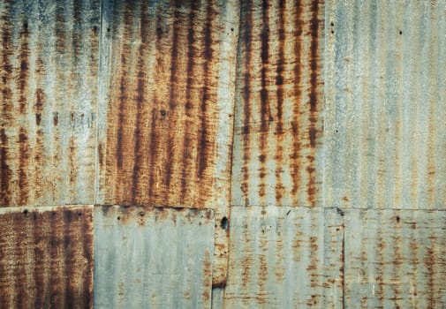 Rusty corrugated galvanize steel wall texture background in vintage filter effect