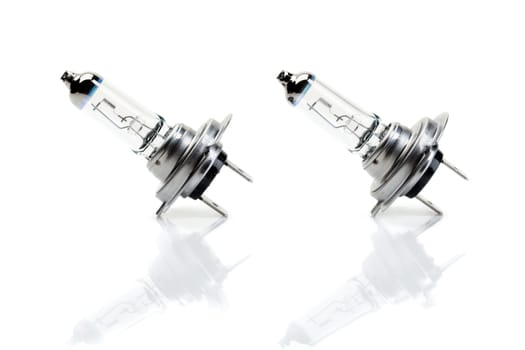 Set beam bulb H7 with reflection on white background. Isolate.