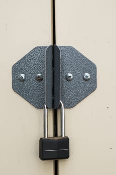 steel doors secured by padlock for security