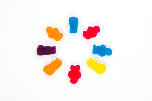 A group of jelly baby athletes performing synchronized swimming.