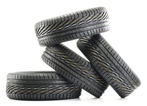 Four new black tires isolated on white background