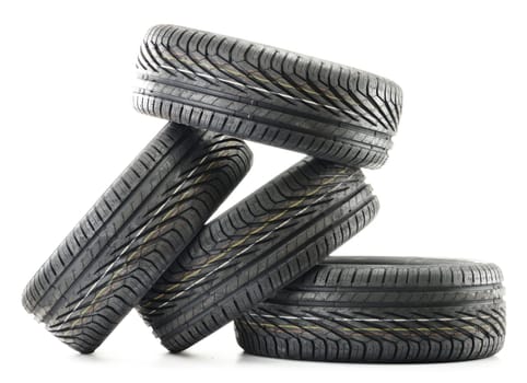 Four new black tires isolated on white background