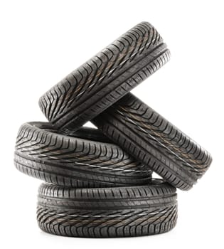 Four new black tires isolated on white background