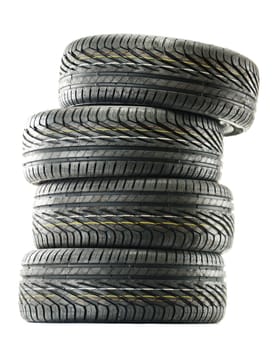 Four new black tires isolated on white background