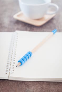 Open blank notebook with pencil, stock photo
