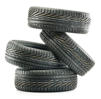 Four new black tires isolated on white background