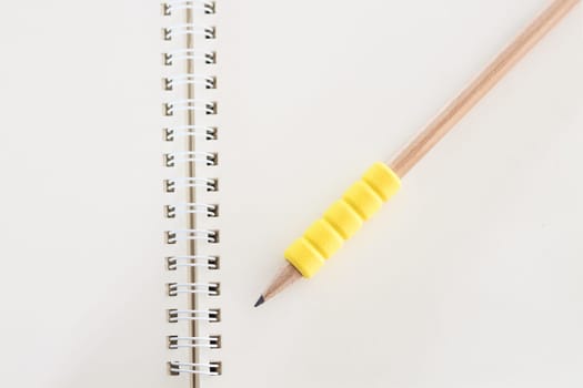 Open blank notebook with pencil, stock photo