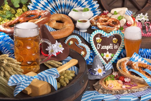 All typical Bavarian dishes in one picture. Pretzels,gingerbread,white sausage,obazda and beer.