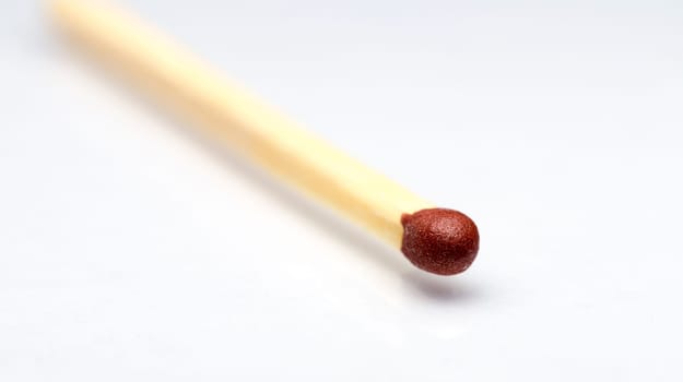 Match Close Up on White Background fading away.