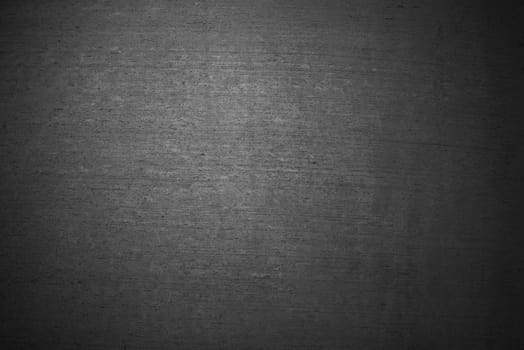 Background of a dark grey stone wall