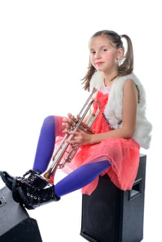 a young and pretty musician is sitting on loudspeakers on white background