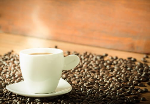 Coffee on teak wooden background, vintage