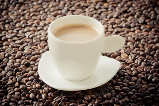 Coffee on teak wooden background, vintage