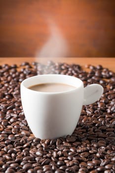 Coffee on teak wooden background, vintage