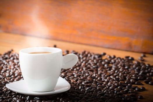 Coffee on teak wooden background, vintage