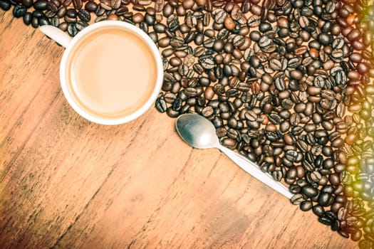 Coffee cup and coffee beans, vintage style