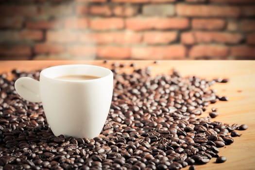 Coffee on teak wooden background, vintage