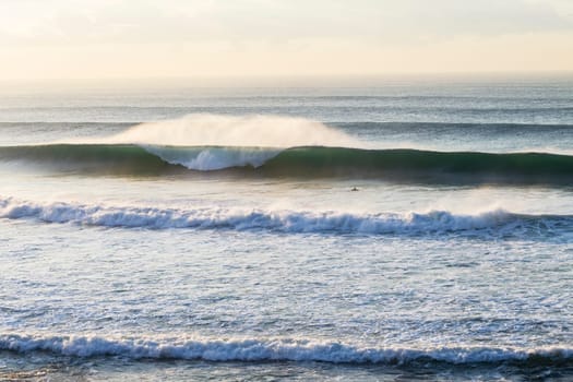 Ocean wave swells crashing water power coastline landscape.