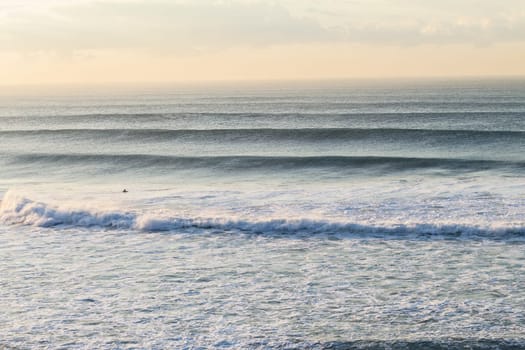Ocean wave swells crashing water power coastline landscape.