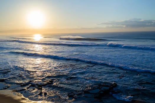 Ocean waves dawn sunrise crashing water power landscape