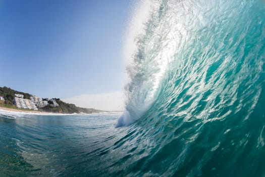 Ocean wave colors of water crashing hollow energy power closeup swimming encounter.