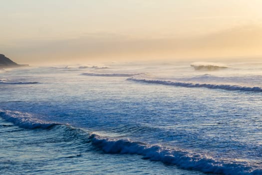 Ocean wave swells crashing water power coastline landscape.