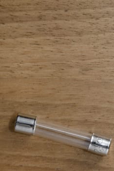 A fuse on a wood table
