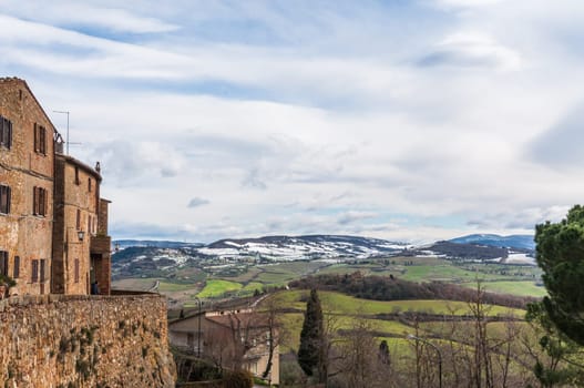 tuscany landscape in little town during winter