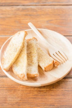 Tasty toasted multi grain bread with butter, stock photo
