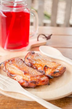 Chicken grilled steak on wooden plate, stock photo