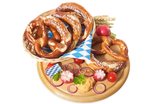 Bavarian vegetarian breakfast with pretzels and obazda on wooden board