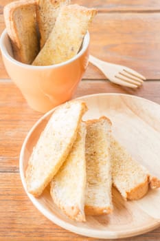 Tasty toasted multi grain bread with butter, stock photo
