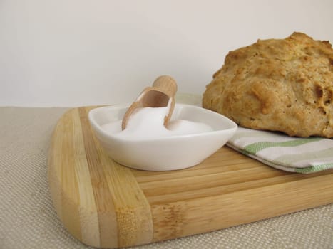 Homemade round soda bread and baking soda
