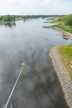 Curved bank of the Elbe with breakwaters and indentations