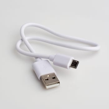 USB cable for data and charging on white