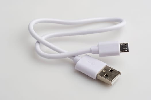 USB cable for data and charging on white
