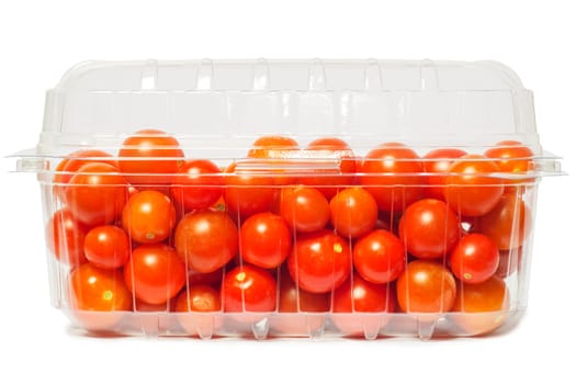 Cherry tomato in plastic package, studio isolated on white
