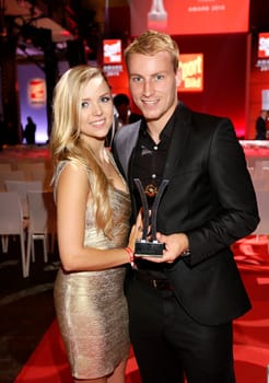 Fabian Holland with girlfriend Louisa Schueler , Sport-Bild - Award 2015 at the Fischmarkthalle Hamburg
