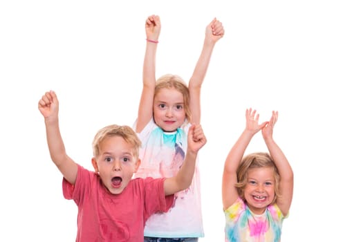 funny children jubilating in front of white background