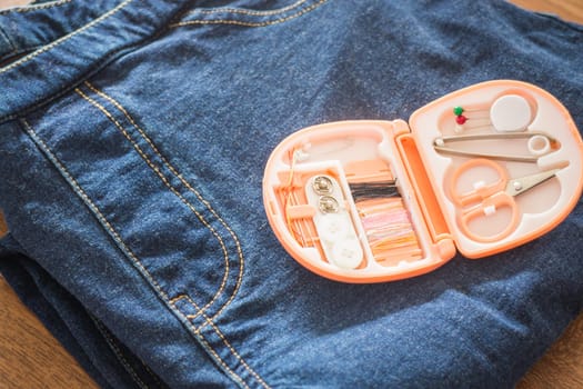 Sewing toolkit prepare to fix jean, stock photo